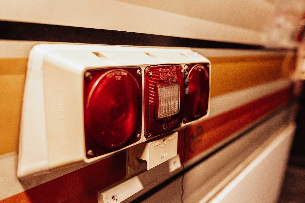 Close-up of a red light panel prop in the Dynamic Duo escape room