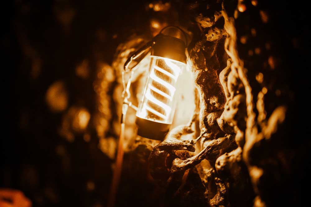 Glowing lantern prop inside the Eldritch Emporium escape room