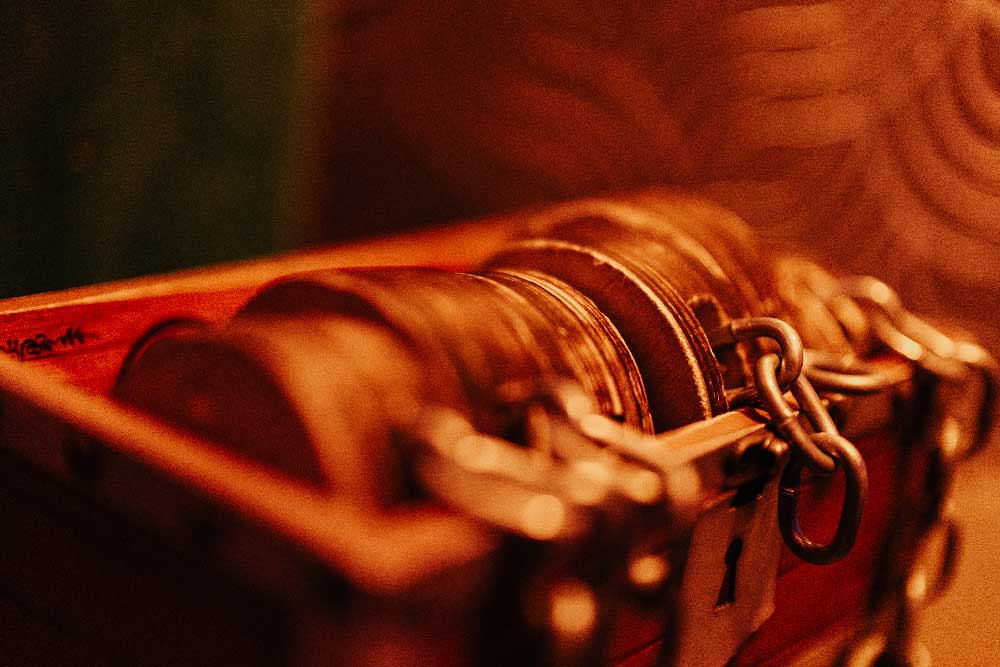 Close-up of a locked chest prop inside the Shrine escape room