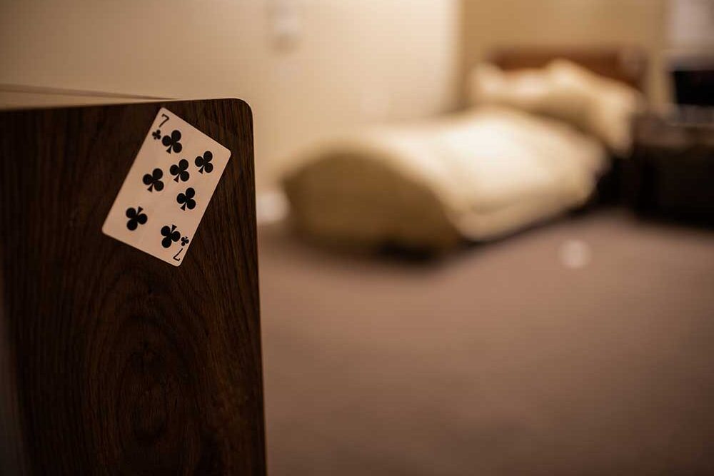 playing card clue in an escape room